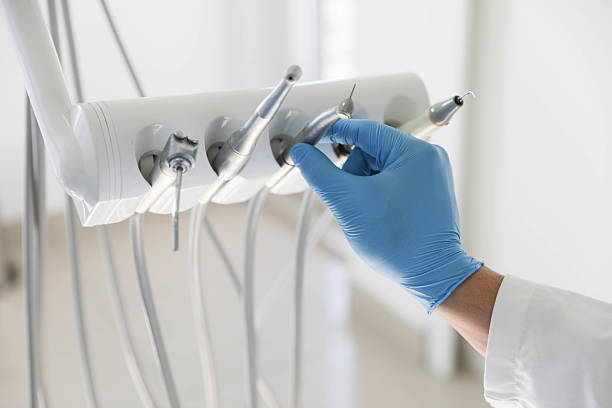 Professional Tooth Extraction technician working in Mackinac County County, MI